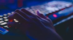 photo of person typing on computer keyboard